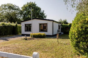 Familie bungalow op vakantiepark bij zee